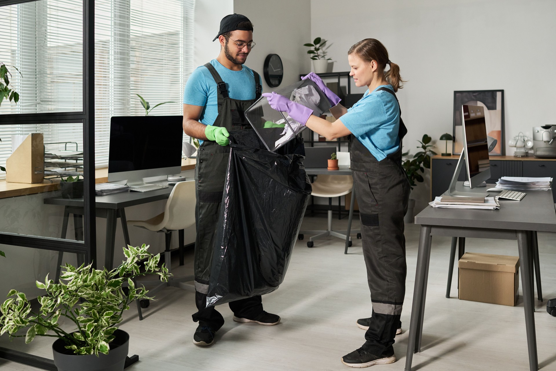Cleaning Workers Working In Team In Office